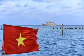 Vietnamese flag is seen at Sinh Ton Dong (Sin Cowe East) island, part of Vietnam’s Truong Sa archipelago in April, 2023. (Photo: baoquocte.vn)