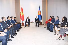 Minister of Public Security Sen. Lieut. Gen. Luong Tam Quang on August 28 has a meeting with Secretary-General of ASEAN Kao Kim Hourn in Vientiane. (Photo: VNA)