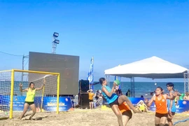Players compete in the 2023 National Beach Handball Championship in October. The best one were selected to form the national team which will compete in the world championship next month in China. (Photo of VHF) 
