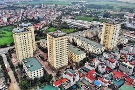 Social housing blocks in Hanoi for workers at the Thang Long Industrial Park. The target is that all industrial parks and export processing zones in the city have social housing. (Photo: VNA)