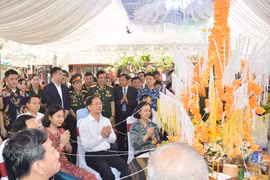 Party, State leaders join Lao traditional festival