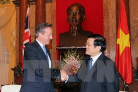 President Truong Tan Sang greets UK Prime Minister