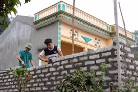 Impoverished rural families access loans for housing