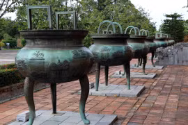 Photo: Cuu dinh” (Nine Dynastic Urns) are placed in front of the Hien Lam Pavilion inside The To Temple in the Hue Imperial Citadel (Dai Noi) for over 200 years. (Photo: VNA)