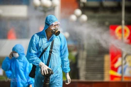 Reporters are a vanguard force in COVID-19 fight (Photo: VietnamPlus)