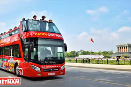 Wandering around Hanoi with double-decker bus city tour