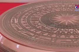 Template of Dong Son drum presented to Hanoi school