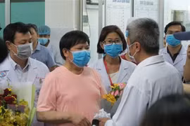 Chinese father and son discharged from hospital