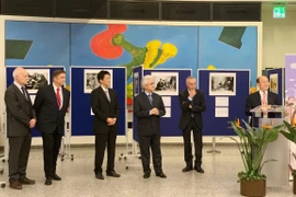 Ambassador Le Dung speaks at the exhibition (Photo: VietnamPlus)