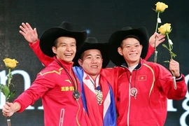 Lifters raise the bar at int'l tournament