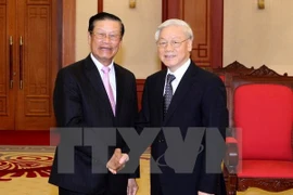 Leaders welcome Lao guests