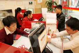 Improved economy helps Vietnamese banks 