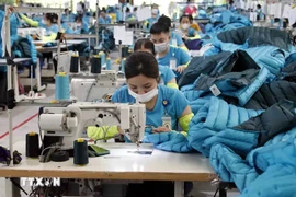 Garment and textile firms face formidable challenges in 2023. (Photo: VNA)