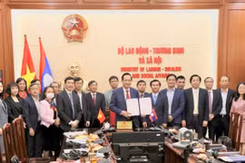 Vietnam, Laos ink cooperation deal on labour and social welfare