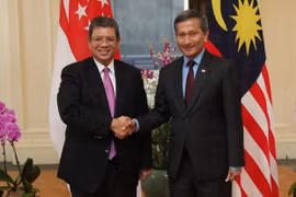 Singapore, Malaysia agree on measures to ease air, sea tensions