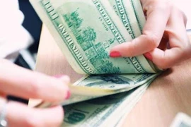 Reference exchange rate down 4 VND on December 10