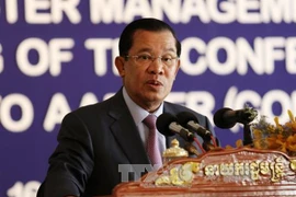 Cambodian peacekeepers equipped with armoured vehicles