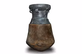 Wooden burial jar with bronze drum recognised as national treasure