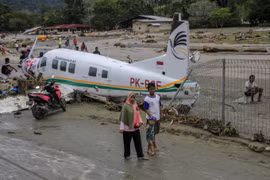 Death toll from Indonesia floods rises to 80
