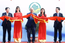 PM attends opening of exhibition on new-style rural area development