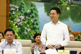 MIC leader answers deputies’ questions at NASC’s 36th session