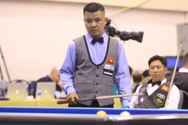 Vietnamese cueists win first match at three cushion billiard world event