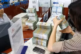 Reference exchange rate down 5 VND