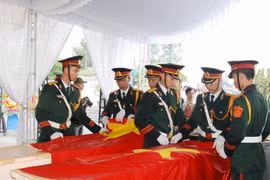 Quang Tri reburies martyrs’ remains repatriated from Laos