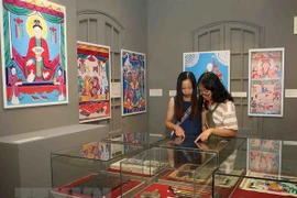 Vietnamese folk paintings displayed in Thang Long Citadel