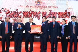 PM lauds workers’ contributions to national development 