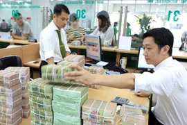 Reference exchange rate down 18 VND on May 11