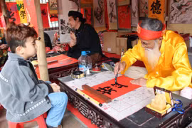 Tet event features folk art, calligraphy