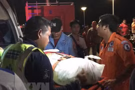 Helicopters, divers deployed to search for capsized Thai boat victims