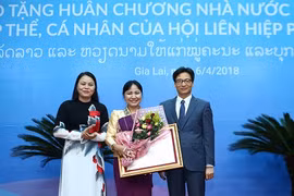 Vietnam, Laos honour women’s union activists