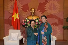 Legislative leader receives Lao NA ethnic committee’s delegation