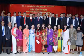 Vietnamese, Lao PMs join traditional Tet celebration in Vientiane