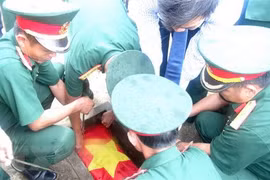 Remains of 30 voluntary soldiers reburied in Dien Bien 