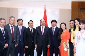 PM urges Vietnamese expatriates in Europe to promote solidarity