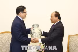 PM promises optimal conditions for Korean investors