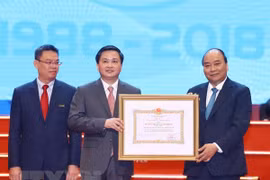 PM requests VietinBank to boost transparency, financial capacity