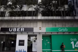 Grab, Uber fined nearly 10 million USD in Singapore