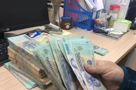 Reference exchange rate down 29 VND