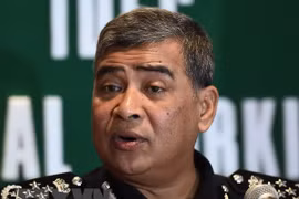 Malaysia bans series of ex-officials from leaving