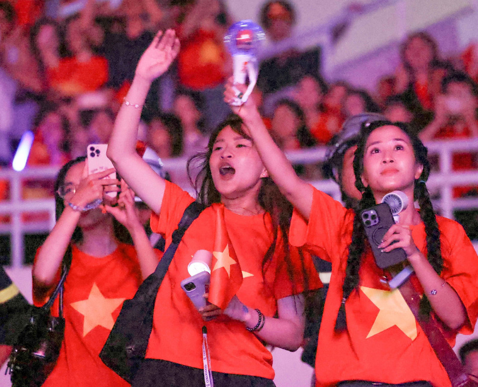 Young audience attends the programme. (Photo: VNA)
