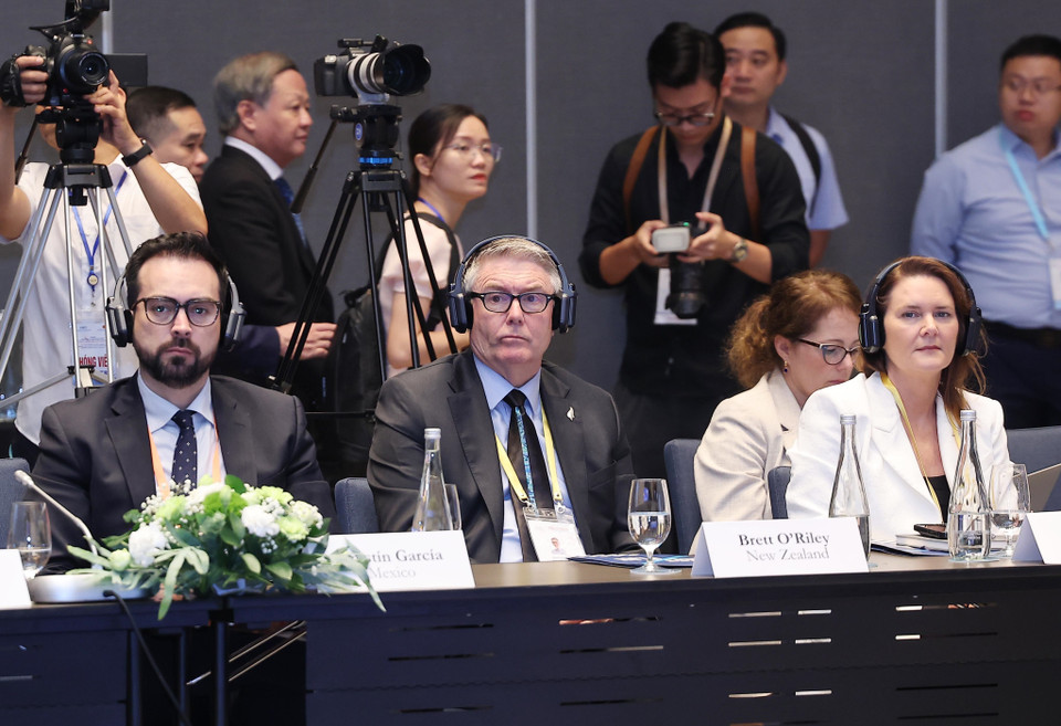 Delegates attend the opening session of the third ABAC meeting. (Photo: VNA)