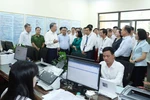 Party leader inspects two-tier local government operations in Hanoi