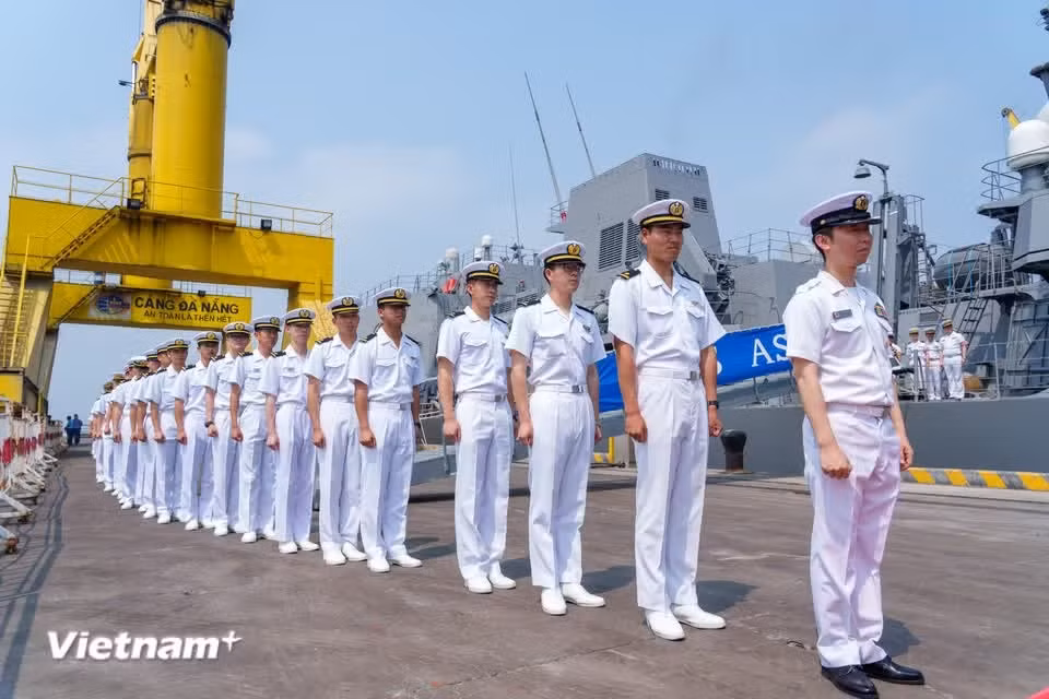 Japanese naval officers line up on the pier ahead of the official welcoming ceremony at Tien Sa Port. (Photo: VietnamPlus)