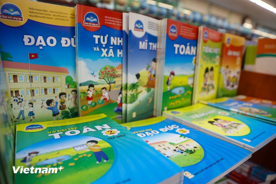 Complete textbook sets are now available at bookstores nationwide, ahead of the upcoming school year. (Photo: VietnamPlus)