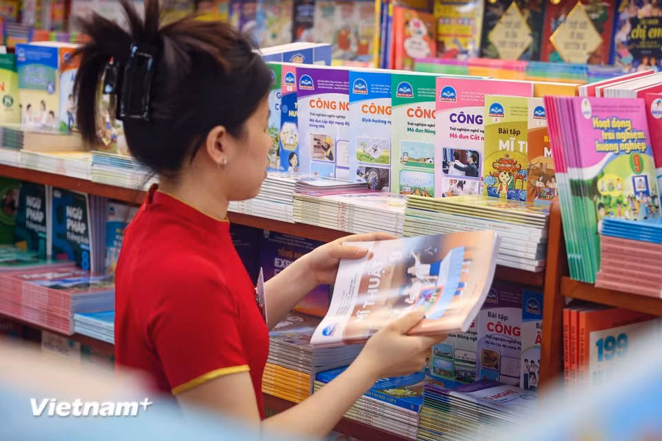 Retailers are fully stocked with textbooks, ready to serve families preparing for the new academic year. (Photo: VietnamPlus)