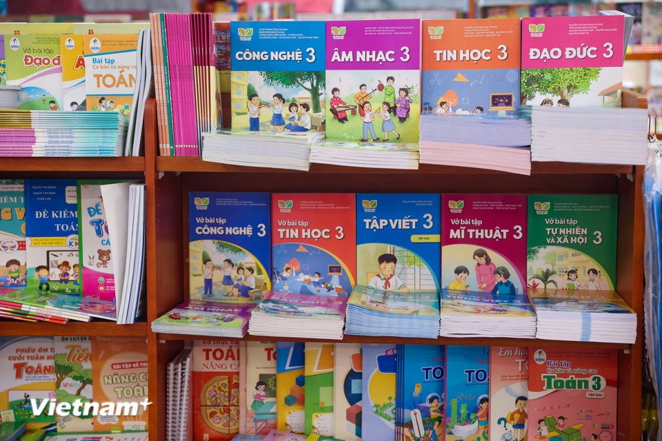 Retailers are fully stocked with textbooks, ready to serve families preparing for the new academic year. (Photo: VietnamPlus)
